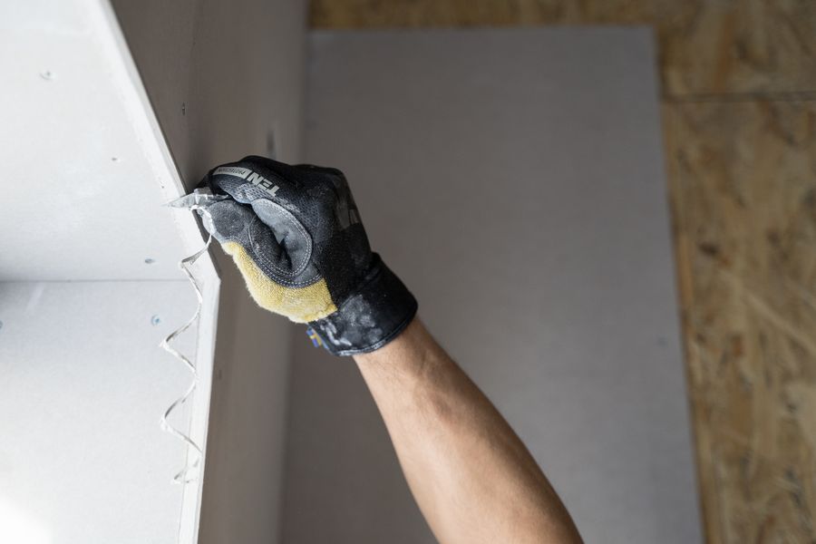 Drywall patch repair in progress